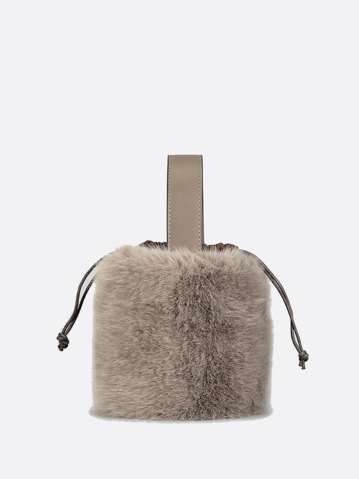 Sac à main avec fausse fourrure beige