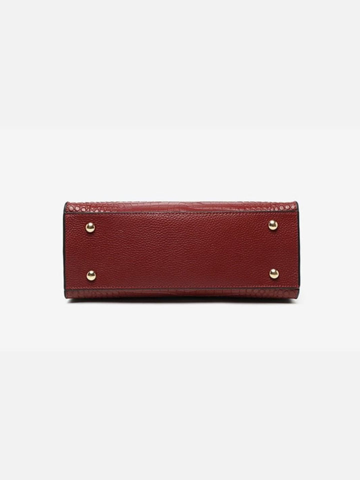 Crocodile trapeze handbag